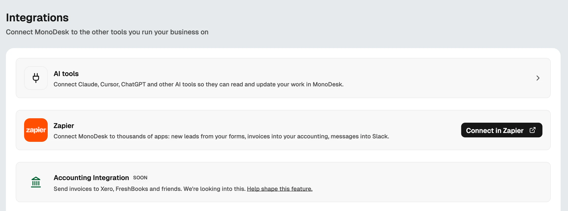 The Integrations page in MonoDesk Settings, with AI tools, the Zapier card and its Connect in Zapier button.